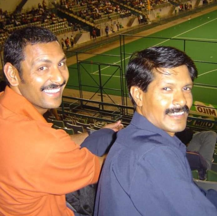 Colleagues Harendra Singh (l) and CR Kumar in 2007, watching Champions Trophy at Bukit Jalil facility