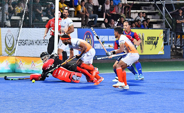Sukhjeet scores against Malaysia